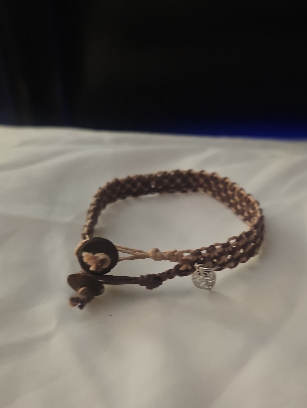 Handwoven Brown Cord Bracelet with Silver Leaf Charm